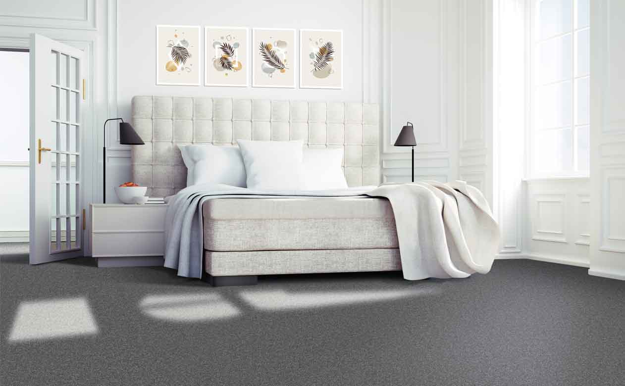 textured grey carpet in a calming bedroom